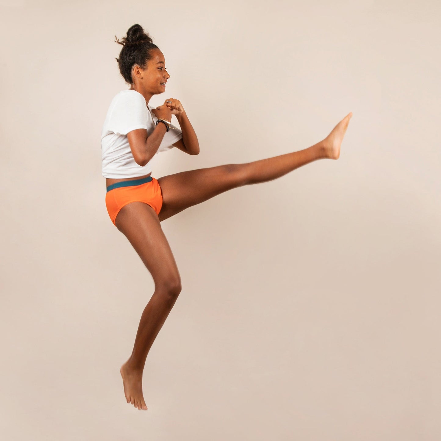 braguita menstrual ado Sara naranja salto